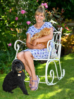 Marion with her cat Rudy and dog Hector