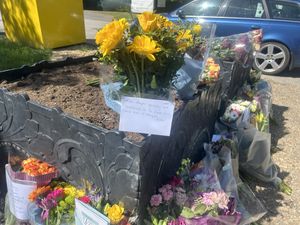 Floral tributes outside Bicester Fire Station