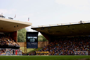 WOLVERHAMPTON, ENGLAND - AUGUST 09: Players, match officials and fans take part in a minute's silence in memory of former football player Diogo Jota and his brother Andre Silva, who passed away on the 3rd of July 2025 during the pre-season friendly match between Wolverhampton Wanderers and Celta Vigo at Molineux on August 09, 2025 in Wolverhampton, England. (Photo by Jack Thomas/Getty Images)