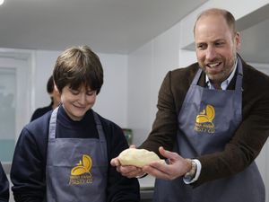 Supporting image for story: William jokes with customer while taking Cornish pasty order on St Piran’s Day
