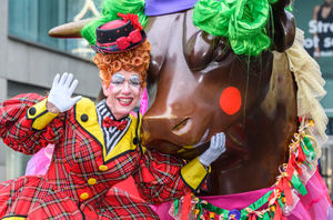 Panto Dame Andrew Ryan meets the Bull outside the Bullring in Birmingham City Centre.

