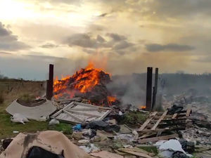 Supporting image for story: WATCH: Firefighters battle 20 tonnes of flaming fly-tipped rubbish for whole day