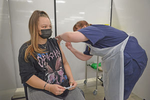 Katie Bonass said she was worried about side effects, but was still determined to get the jab