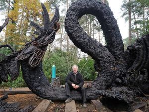 Supporting image for story: This enormous dragon is made from 300 tonnes of old horseshoes