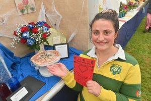 Young farmer Abbey Lewis and her winning display.