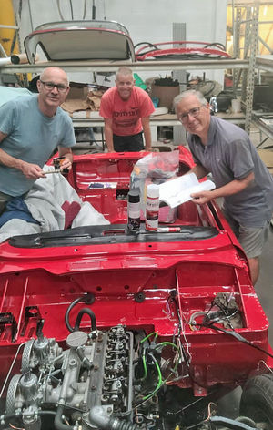 The Shropshire Spitfire team working on its restoration.