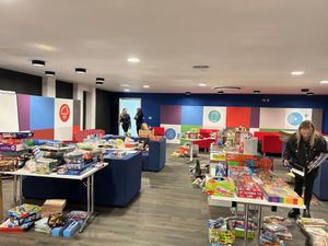 Santa's Little Stars Christmas wrapping the gifts.