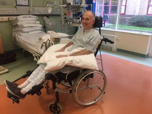 Alan Jenkins is now able to sit in a wheelchair, but without the use of his arms his family want to get him a wheelchair he may be able to operate himself