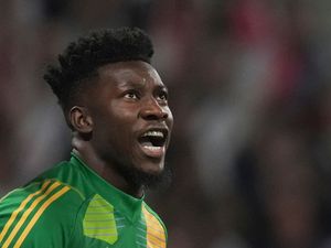 Andre Onana looks to the sky