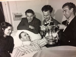 Heath managed to get his hands on the trophy in hospital