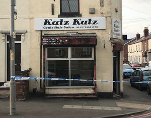 A police cordon at the scene of the shooting at Katz Kutz barbershop