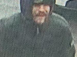 Supporting image for story: Man wanted over theft of charity box from shop