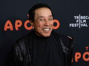 Smokey Robinson smiling at a movie festival