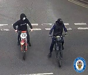 This image has been released of the two motorbike riders caught on camera. Photo: West Midlands Police