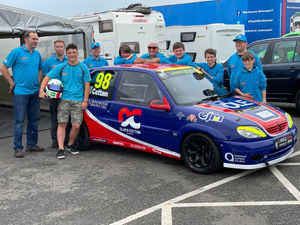 Supporting image for story: Ollie, 15, makes his mark on the race track