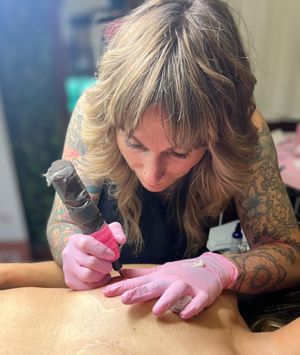 Lauren at work creating hyper realistic medical nipple tattoos.