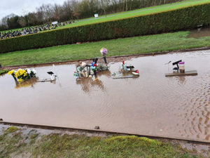 Supporting image for story: 'It's torture to see this': Heartbreak as flooding leaves baby graves submerged