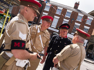 Military Police with Branch Chairman of the Royal British Legion, Bob McBride.