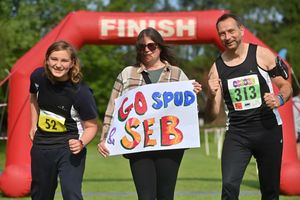 Alana Clarke with a banner from Hot House Church, with Seb 12 Simms and Spud Simms, they were all ready for the event today
