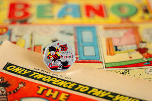 A Dennis The Menace 50p coin unveiled by The Royal Mint in partnership with Beano to mark 75 years of Dennis the Menace, at the comic's Dundee headquarters. Photo: Euan Cherry/PA Media Assignments