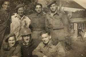 Stan, bottom right, with friends in Belgium late 1944-45