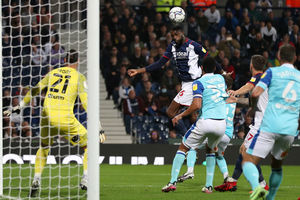 Semi Ajayi of West Bromwich Albion rises high to head the ball (Photo: WBA/Adam Fradgley)