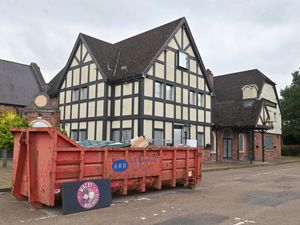 Supporting image for story: Market Drayton pub boarded up with skip on car park weeks after closure
