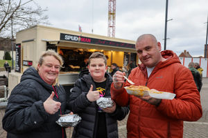 Kathryn Mangles, Zak, and Steven Deere customers from Nottinghamshire with jacket potatoes. 