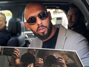 Supporting image for story: Romanian prosecutors lose appeal to jail Andrew Tate