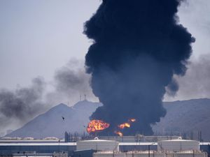 Supporting image for story: Iran war enters third week as Tehran threatens non-US assets in Gulf