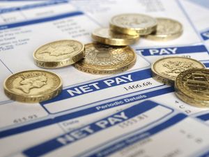 Supporting image for story: Pay growth slows to two-year low as jobless rate edges down