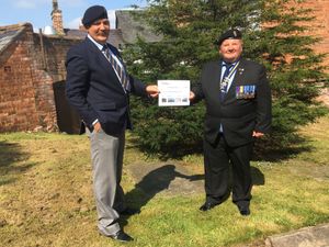 Supporting image for story: Atlantic rowers hand over cash to charity