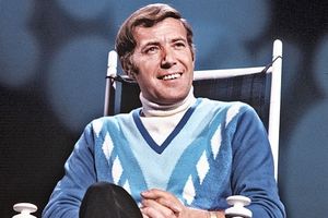Val Doonican sports a polo neck jumper