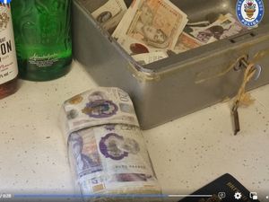 Supporting image for story: Wads of cash and stolen alcohol found after police raid Walsall house 