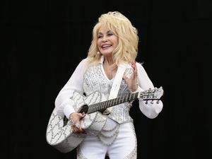 Supporting image for story: Dolly Parton asks Sir Elton John to collaborate on classic hit