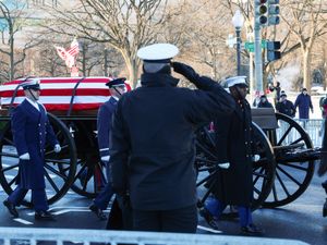 Supporting image for story: Former US president Jimmy Carter’s coffin arrives in Washington