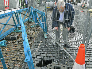 Supporting image for story: Councillor tells firms to work faster after hole opens up in Newport road