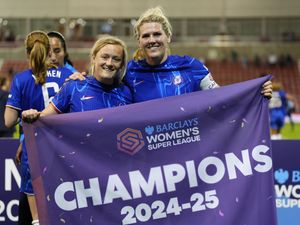 Millie Bright, right, and Erin Cuthbert celebrate Chelsea's Women's Super League triumph
