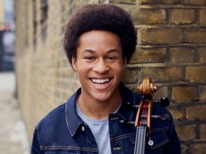 Supporting image for story: Royal Wedding cellist Sheku Kanneh-Mason wows crowds in Birmingham - review