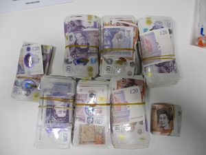 Supporting image for story: £60,000 cash found in glovebox and boot as drug suspects stopped on motorway