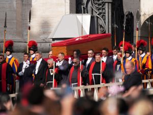 The body of Pope Francis is carried through St Peter’s Square to St Peter’s Basilica at the Vatican