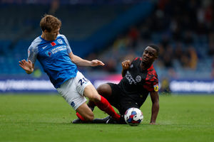 Christian Saydee of Shrewsbury Town and Sean Raggett of Portsmouth (AMA)