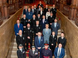 Supporting image for story: Police officers acknowledged for long service with awards
