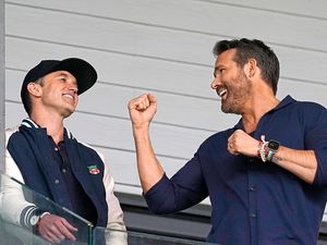 Supporting image for story: Wrexham owners Ryan Reynolds and Rob Rob McElhenney secure Racecourse Ground lease