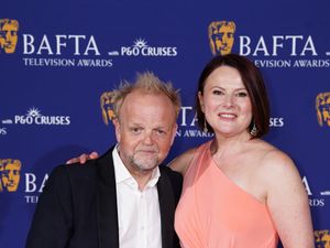 Toby Jones and Monica Dolan in the press room during the 2025 Bafta Television Award