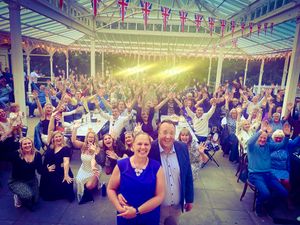 Jenni and Lee Percy with supporters at the launch of the new Llandrindod Wells tearoom at the Rock Park. Credit: Natalie Ellis
