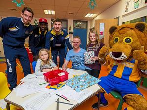 Supporting image for story: Video and pictures: Shrewsbury Town players visit children's ward