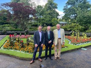 The former mayor of Shrewsbury David Vasmer (centre) with representatives from Omega and Shropshire Mental Health Support