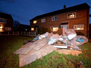 Supporting image for story: Presents left floating as burst pipe floods Shrewsbury homes on Christmas Day