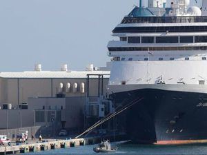 Ambulances, at left, arrive after the cruise ship Zaandam docked (Wilfredo Lee/AP)